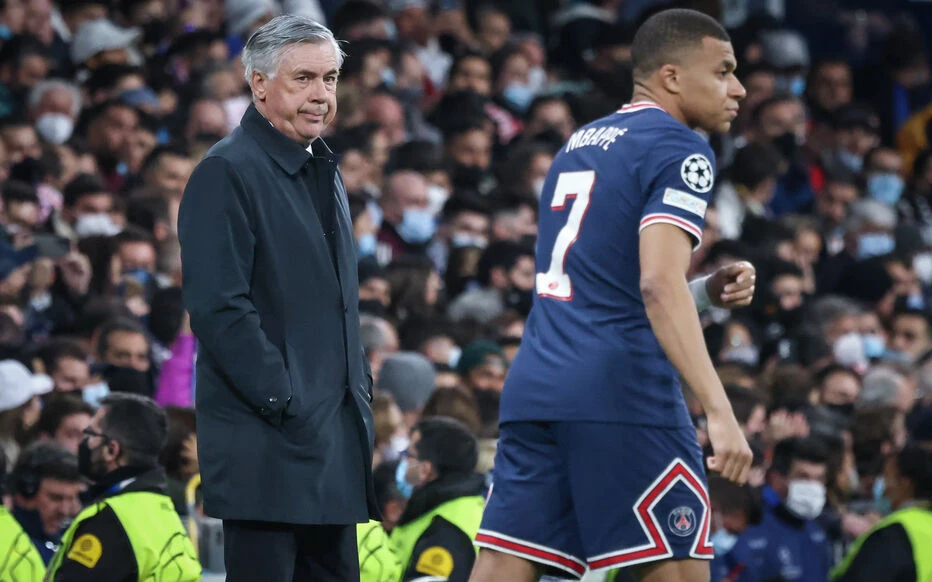 HLV Ancelotti tỏ vẻ không quan tâm đến việc Mbappe đầu quân cho Real Madrid. Ảnh: GETTY. tong-thong-phap-yeu-cau-real-madrid-cho-mbappe-thi-dau-olympic-paris (2).jpg