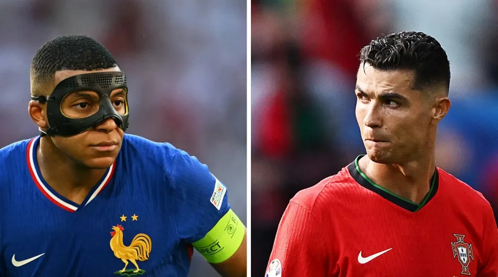 Đội trưởng Mbappe sẽ đụng độ thần tượng Ronaldo ở tứ kết Euro 2024. Ảnh: GETTY. doi-truong-mbappe-dung-do-nay-lua-voi-than-tuong-ronaldo (2).jpg