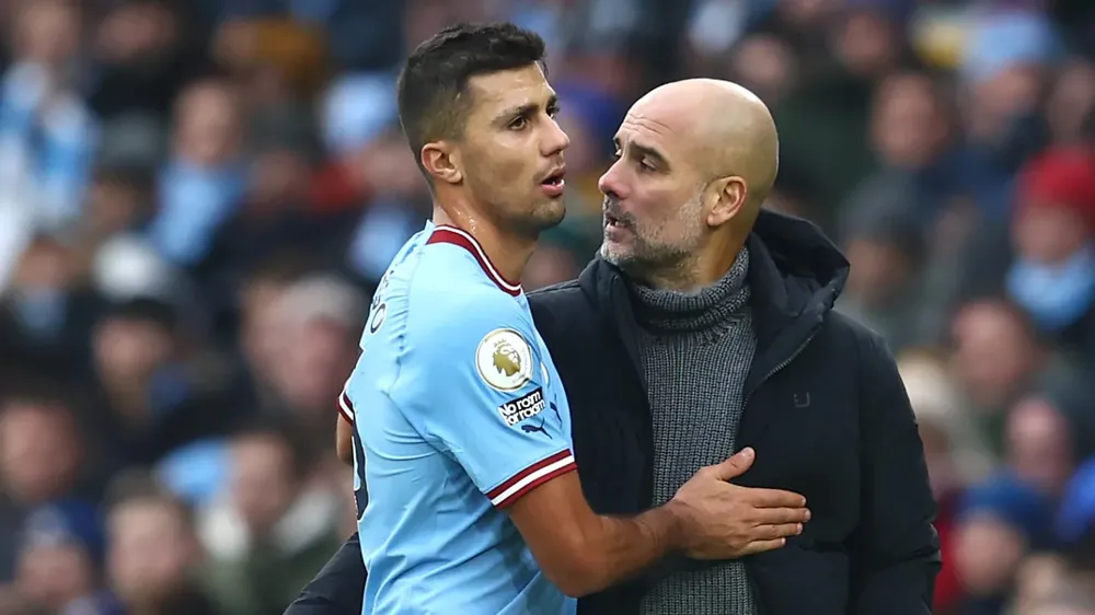 Học trò cưng của HLV Pep Guardiola có nguy cơ treo giò sau những trò khiêu khích mà Rodri cùng đồng đội thực hiện khi vô địch Euro 2024. Ảnh: GETTY. 10-nam-cua-hlv-pep-guardiola-va-don-trung-phat-cho-rodri (2).jpg