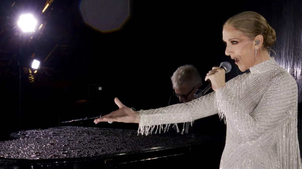 Celine Dion gợi lại cảm xúc về một mối tình bi thảm có thật nổi tiếng nước Pháp. Ảnh: GETTY. danh-ca-celine-dion-va-cam-xuc-ve-moi-tinh-bi-tham-o-le-khai-mac-olympic-paris-2024 (3).jpg