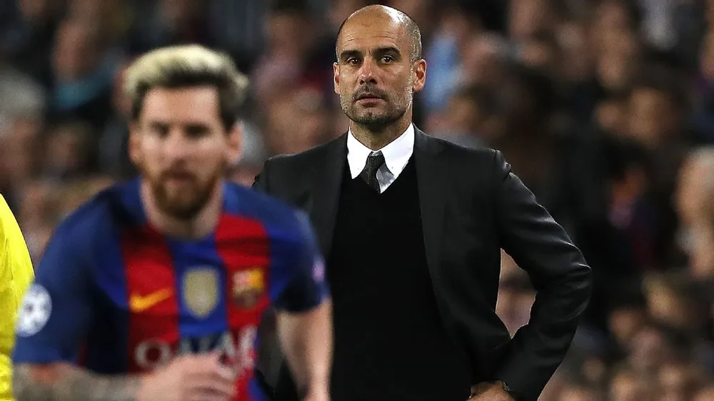HLV Pep Guardiola tiếc nuối khi không thể tái hợp với siêu sao Messi. Ảnh: GETTY. chi-tiet-thuong-vu-hlv-pep-guardiola-dua-messi-ve-man-city (3).jpg