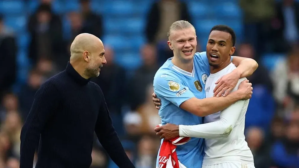 HLV Pep Guardiola hết lời khen ngợi học trò cưng Haaland. Ảnh: GETTY. hlv-pep-guardiola-dat-tien-dao-haaland-ngang-hang-messi-va-ronaldo (3).jpg