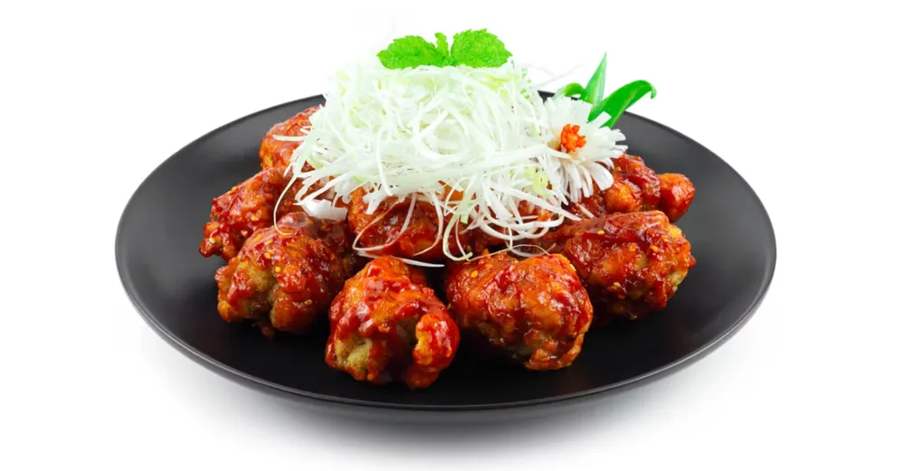 Món ăn yêu thích như gà 65 cực cay. Ảnh: Thetravel.