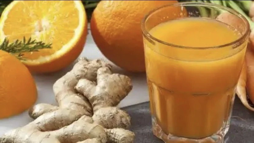 Nước cam và gừng. Ảnh: STEP TO HEALTH.