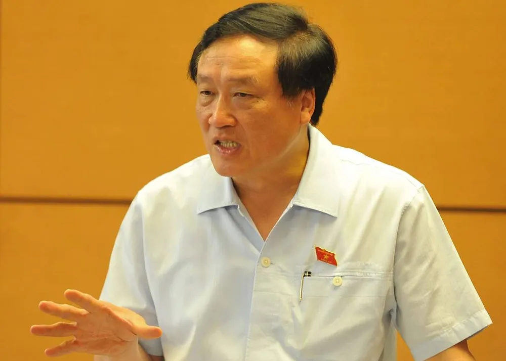 Chánh án TAND Tối cao Nguyễn Hòa Bình phát biểu tại buổi thảo luận tổ về Luật Bồi thường nhà nước chiều 27-10. Ảnh: CHÂN LUẬN