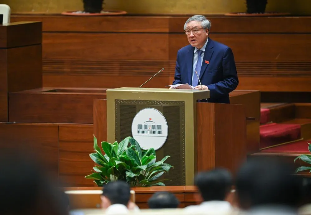 Chánh án TAND Tối cao Nguyễn Hòa Bình trình bày báo cáo trước Quốc hội. Ảnh: PT