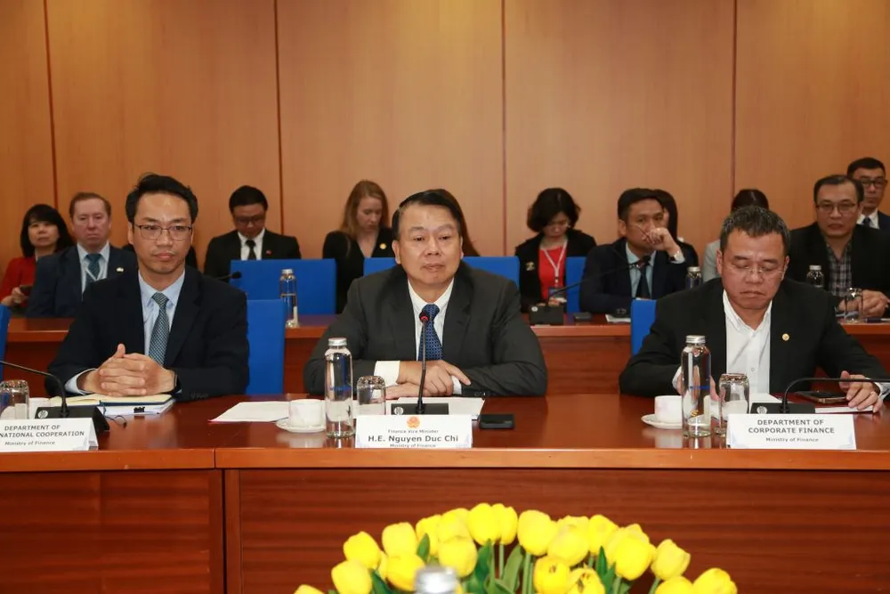 Thứ trưởng Nguyễn Đức Chi chủ trì tiếp đoàn doanh nghiệp Hoa Kỳ sáng 21-3. Ảnh: Đ.MINH