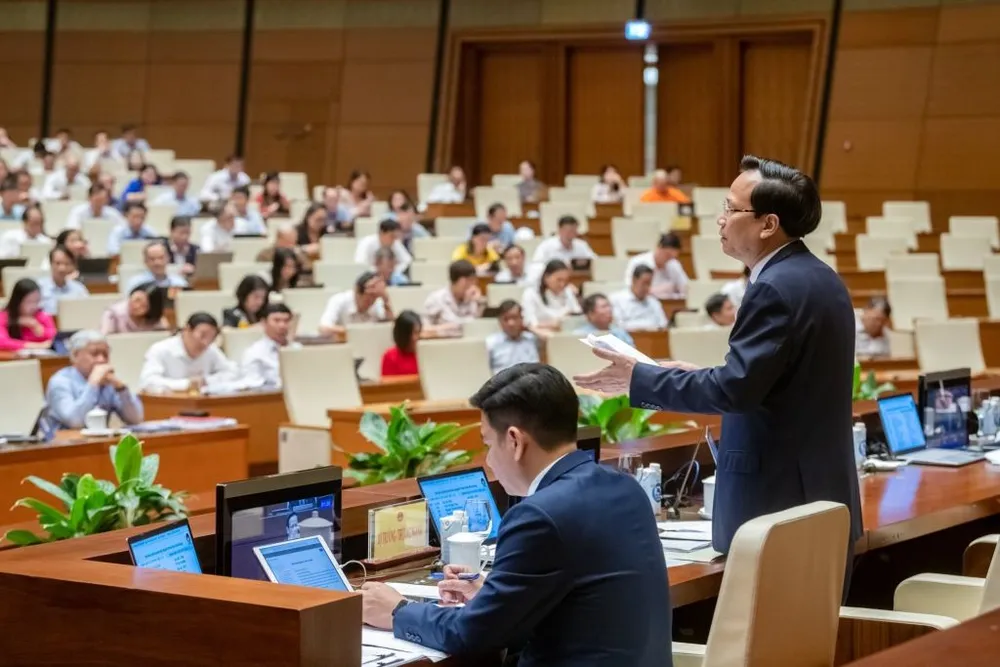 Bộ trưởng Đào Ngọc Dung trả lời chất vấn của Quốc hội. Ảnh: QH Bộ trưởng Đào Ngọc Dung trả lời chất vấn của Quốc hội. Ảnh: QH