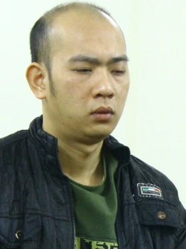 Kẻ chủ mưu cướp ngân hàng tại phiên toà sơ thẩm. tuan-JPG-7850-1418023643.jpg