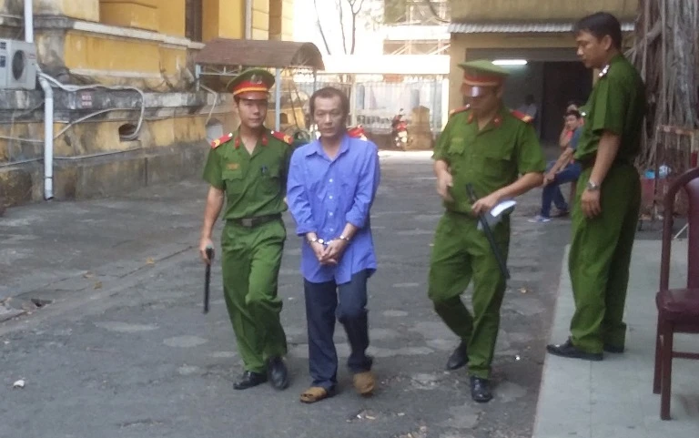 Bắt quả tang người đàn ông hiếp dâm bé gái bị tâm thần ảnh 1