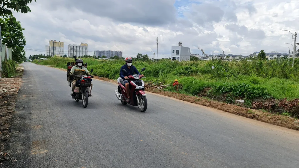 Một đoạn đường Bưng Ông Thoàn đã được nâng cấp. bung-ong-thoan-1.jpg
