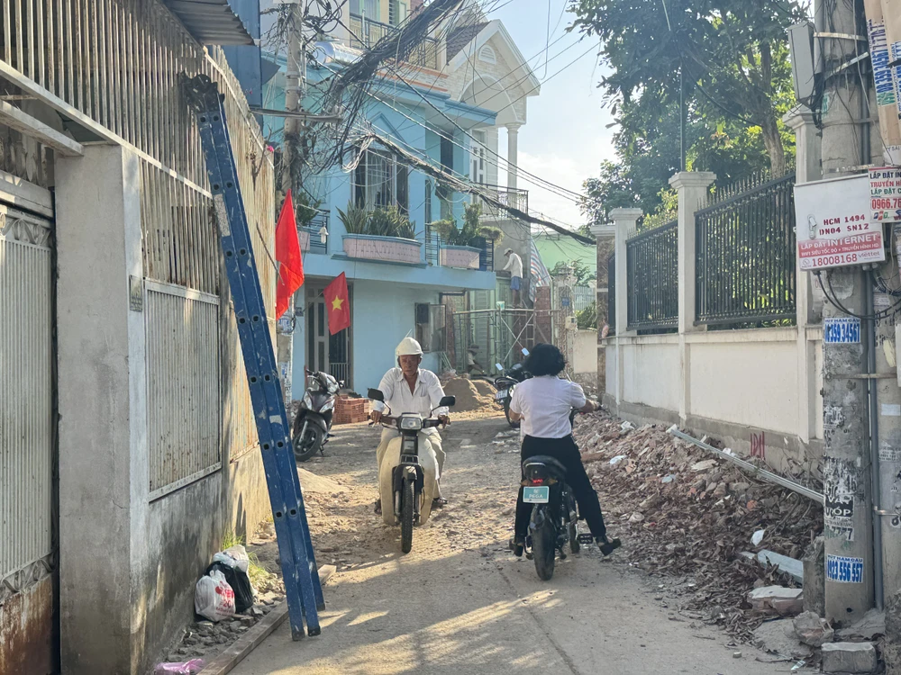 Người dân quận 7 đang tích cực hiến đất, mở rộng hẻm. mở rộng hẻm quận 7