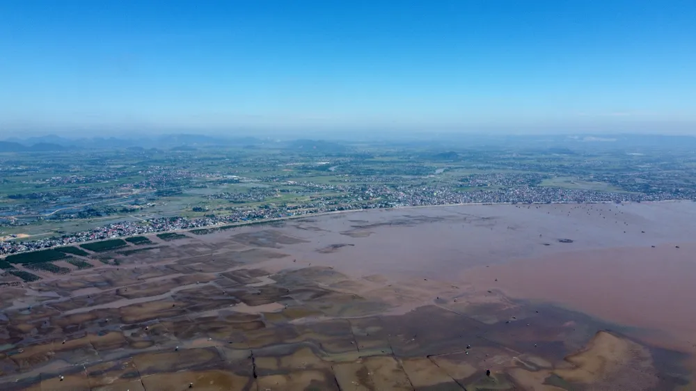 Đó là những cánh đồng nuôi ngao trên bờ biển Hải Lộc, Ngư Lộc (Hậu Lộc).