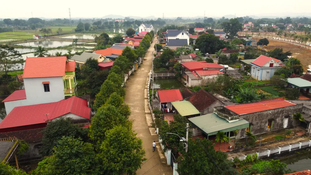 Cận cảnh ngôi làng dân hiến đất mở đường rộng như đô thị - 10.JPG