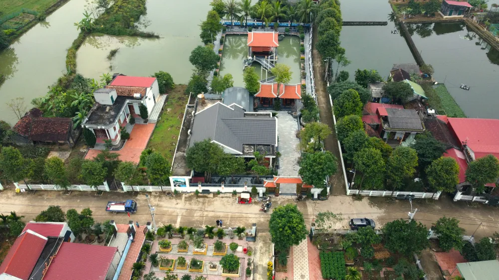 Cận cảnh ngôi làng dân hiến đất mở đường rộng như đô thị - 6.JPG