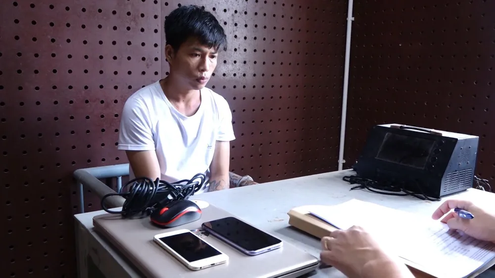 Đối tượng Nguyễn Lương Bằng tại cơ quan công an. Ảnh: CAQB