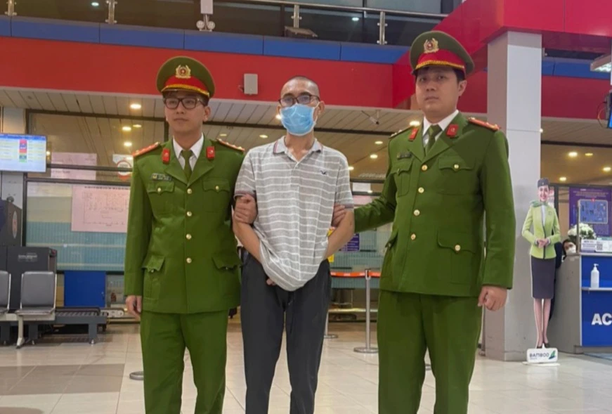 Hoàng Minh Toàn thời điểm bị bắt giữ. Ảnh: CA