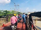 Cuối năm bàn giao mặt bằng cầu bị 'treo' suốt hơn 20 năm qua ảnh 2 Được duyệt gần 20 năm, cầu Long Kiểng vẫn chưa xong