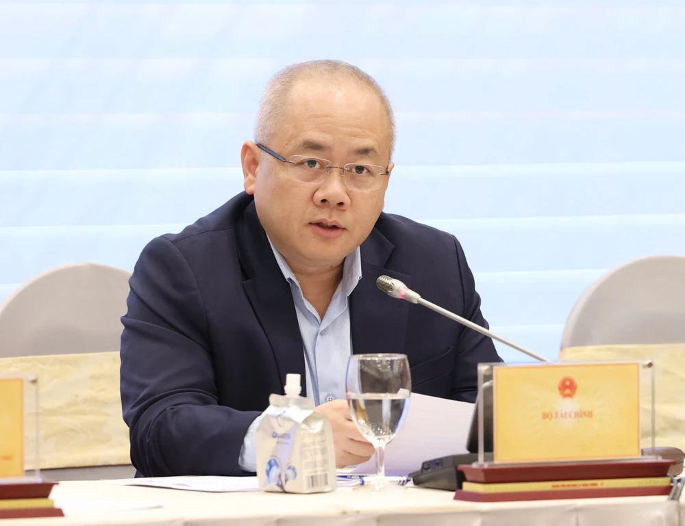 Bộ Tài chính thông tin về lộ trình triển khai thí điểm sàn giao dịch tiền mã hóa. Ảnh: QUANG PHÚC