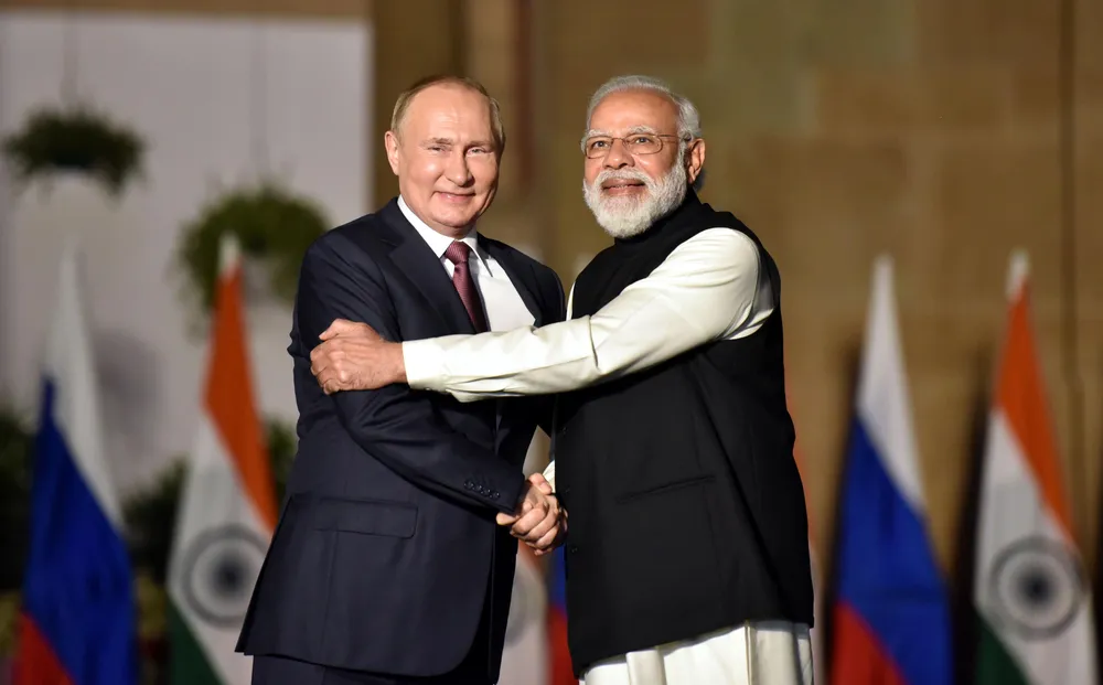 Thủ tướng Ấn Độ Narendra Modi (phải) gặp Tổng thống Nga Vladimir Putin vào tháng 12-2021 ở Ấn Độ. Ảnh: GETTY Thủ tướng Ấn Độ Narendra Modi (phải) gặp Tổng thống Nga Vladimir Putin vào tháng 12-2021 ở Ấn Độ. Ảnh: GETTY