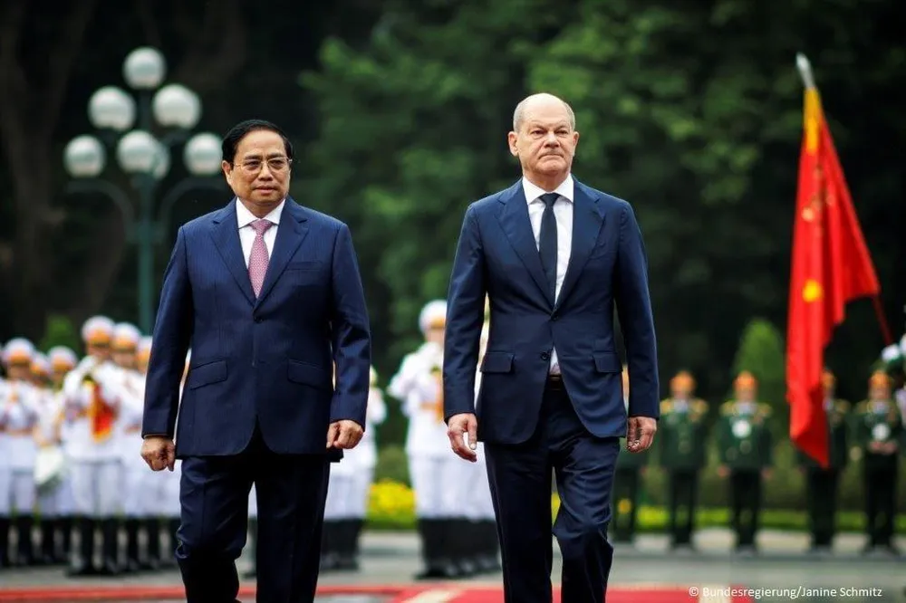 Thủ tướng Phạm Minh Chính đón Thủ tướng Đức Olaf Scholz (phải) thăm chính thức Việt Nam vào ngày 13-11. Ảnh: Bundesregierung/ Janine Schmitz/ Đại sứ quán Đức tại Việt Nam