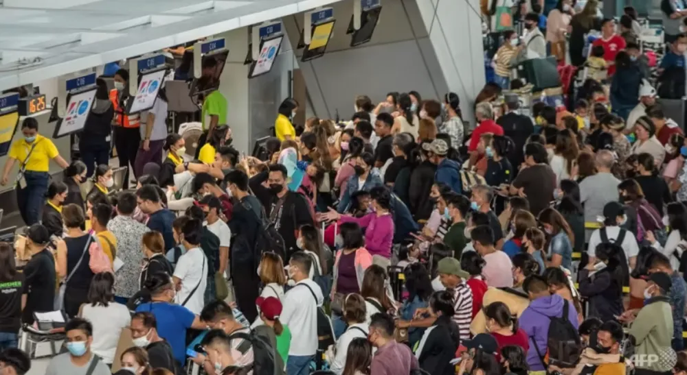 Sự cố ở sân bay quốc tế Ninoy Aquino (NAIA) ảnh hưởng đến hàng ngàn hành khách. Ảnh: AFP