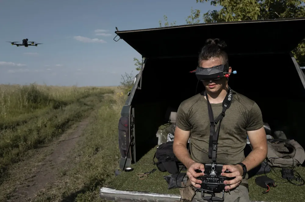 Ukrainian soldiers fire toward Russian positions near the front line in eastern Ukraine earlier this month.png