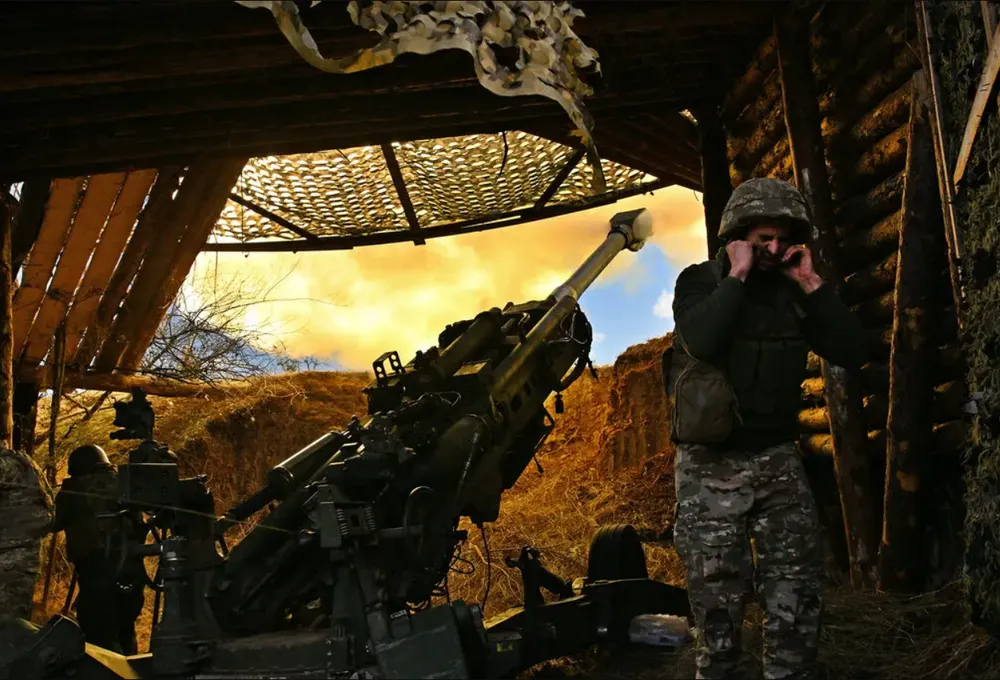 Ukrainian soldiers fire toward Russian positions near the front line in eastern Ukraine earlier this month.png