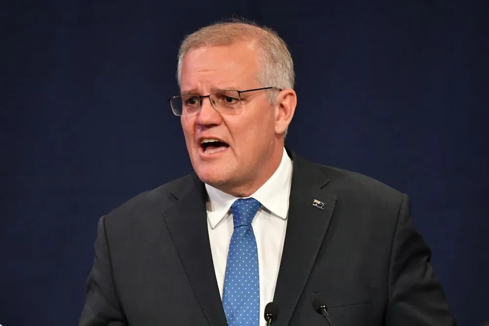Thủ tướng Úc Scott Morrison thừa nhận thất bại trong cuộc bầu cử 2022 khi phát biểu tại TP Sydney (Úc) hôm 21-5. Ảnh: AFP
