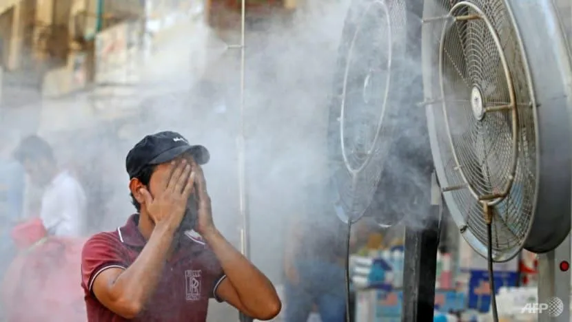 Các đợt nắng nóng nghiêm trọng đang xảy ra trên toàn thế giới. Ảnh AFP