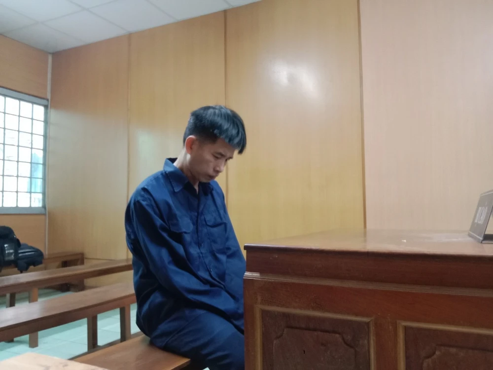 Bị cáo Lê Hoàng Lâm tại toà. Ảnh: ĐL chồng đâm vợ