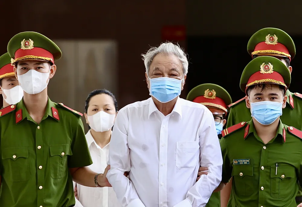 Ông Trần Quí Thanh và con gái tại phiên toà phúc thẩm. Ảnh: HOÀNG GIANG Trần Quí Thanh
