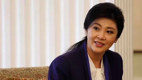 Yingluck Shinawatra, sinh năm 1967, là con út trong gia đình 9 người con. Anh trai bà, Thaksin Shinawatra từng là thủ tướng Thái Lan và mất chức trong cuộc đảo chính của quân đội năm 2006. Ảnh: Reuters. Born 21 June 1967 Youngest of nine children; elder brother is former PM Thaksin Shinawatra Graduate in political science and business administration, master's degree, Kentucky State University Married to businessman Anusorn Amornchat; has one son