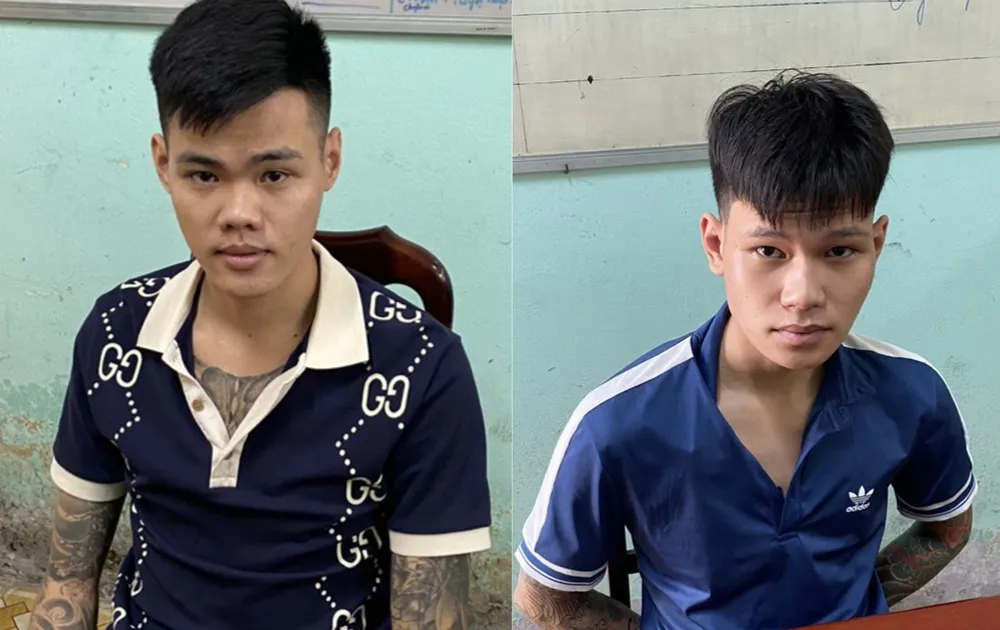 Nguyễn Văn Giang và Đỗ Hải Vân tại cơ quan công an. Ảnh: CA hai nguoi cho vay nang lai.jpg