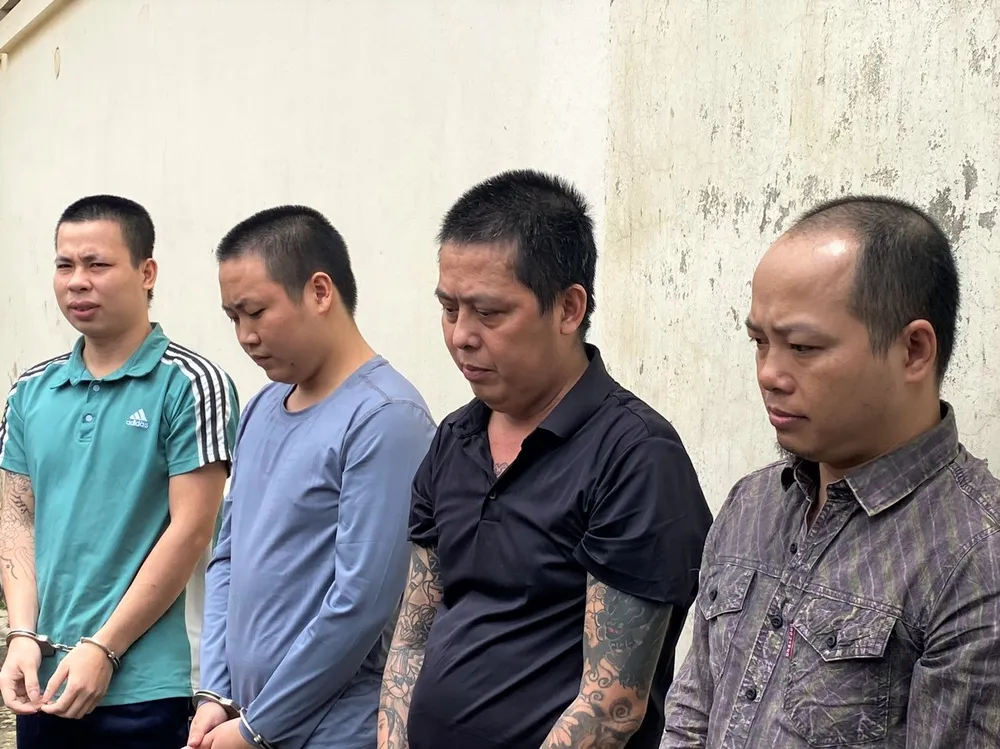 Bốn bị can Hải, Chính, Chiến và Phúc bị cơ quan Công an bắt giữ. Ảnh: CA cho vay nặng lãi.jpg