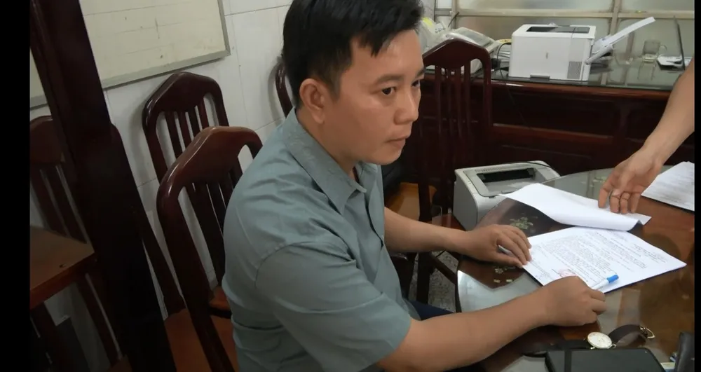 Nhận hối lộ (1).jpg