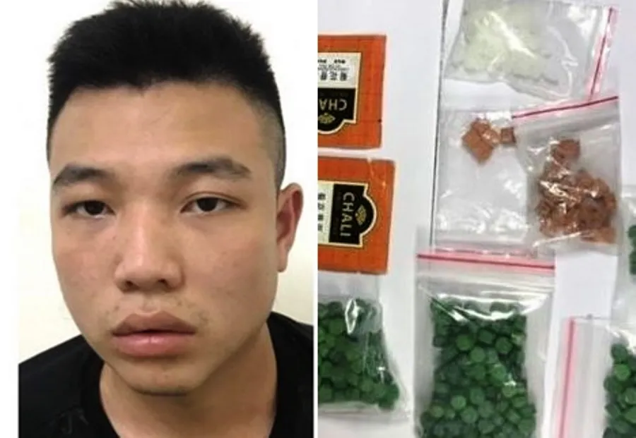 Nghi phạm Nguyễn Tấn Thanh cùng một số tang vật vụ án. Ảnh: H.H