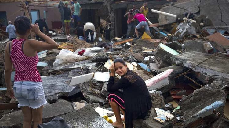 Nhà cửa sập đổ ở Haiti vì bão Matthew ngày 5-10. 