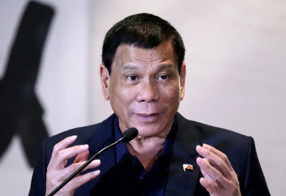 Tổng thống Philippines Rodrigo Duterte trong một cuộc họp báo tại Trung Quốc ngày 19-10. 