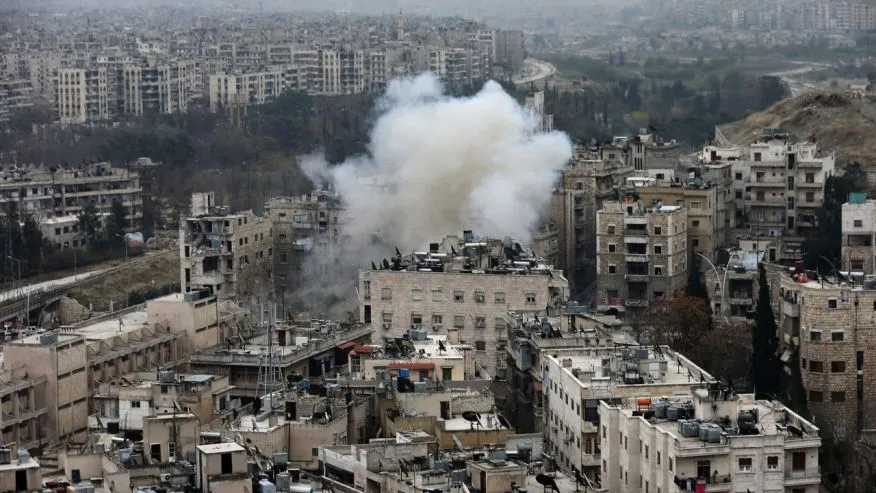 Khu vực phe nổi dậy kiểm soát ở Aleppo bị không kích ngày 5-12. Ảnh: AP 