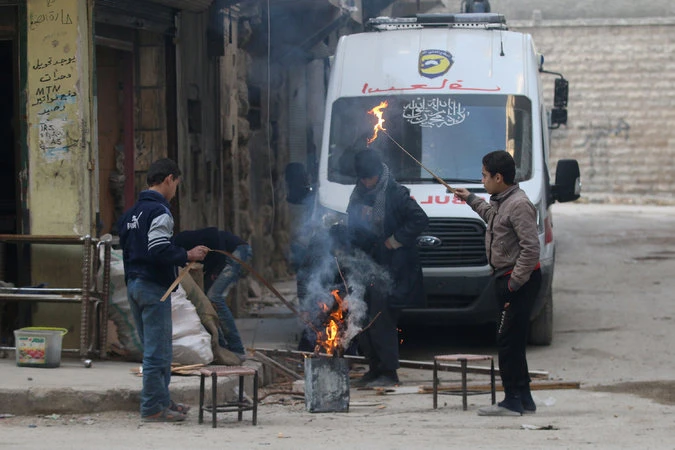 Trong một vùng phe nổi dậy kiểm soát ở đông Aleppo. Ảnh: REUTERS 