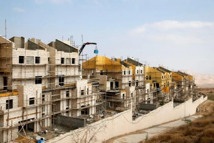 Một khu định cư Israel đang xây ở Bờ Tây, ảnh chụp ngày 28-12. Ảnh: REUTERS 