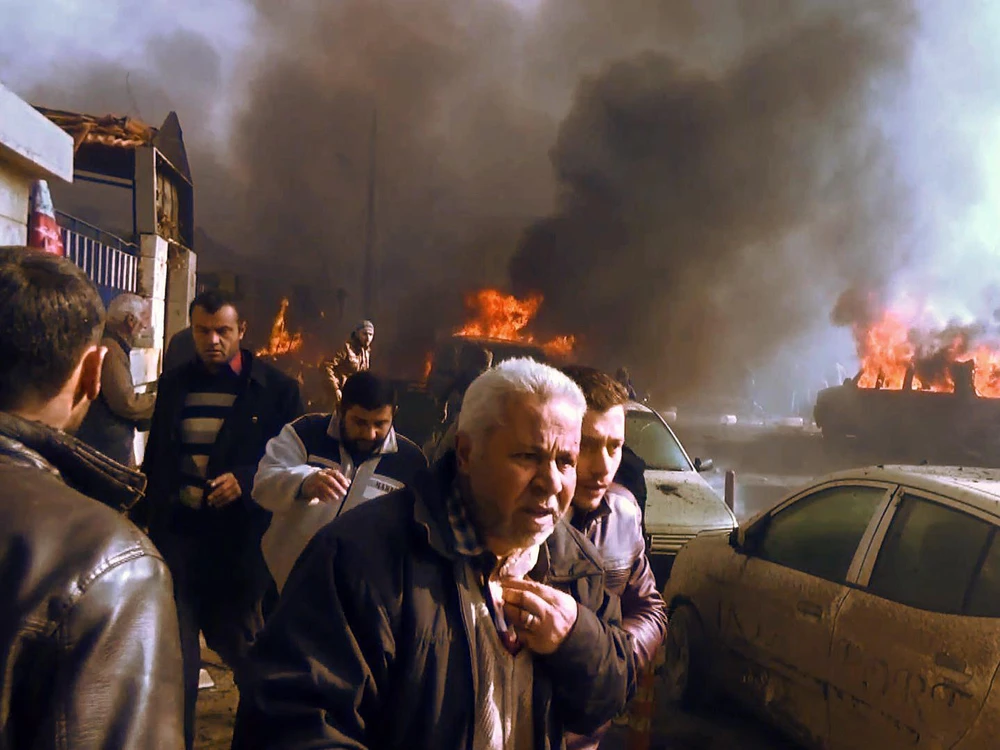 Hàng chục người chết trong vụ đánh bom xe tải này. Ảnh: AFP