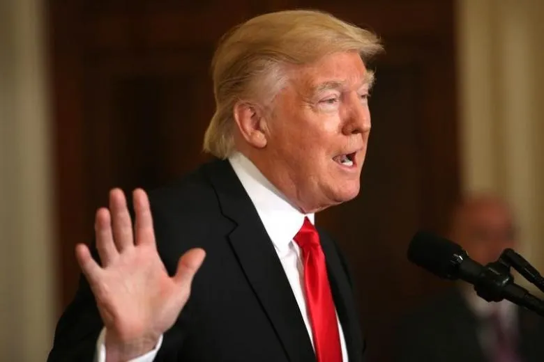 Tổng thống Mỹ Donald Trump tại Nhà Trắng ngày 27-1, vừa ra sắc lệnh cấm dân 7 nước Hồi giáo vào Mỹ. Ảnh: REUTERS