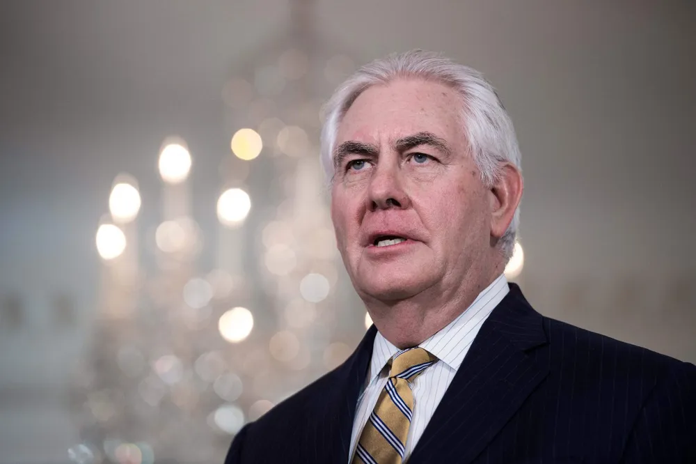 Ngoại trưởng Mỹ Rex Tillerson chỉ ở Bỉ chưa đầy 5 tiếng, về Mỹ khi hội nghị chưa kết thúc. Ảnh: AFP