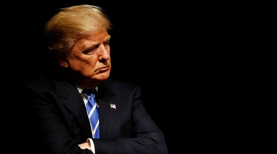 Tổng thống Mỹ Trump đang cân nhắc trừng phạt Nga và Iran vì Syria. Ảnh: REUTERS