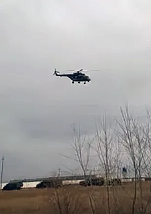 Trực thăng và xe quân sự Nga di chuyển về biên giới Triều Tiên. Ảnh: DAILY MAIL