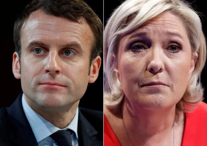 Ông Marcon được dự đoán sẽ thắng bà Le Pen tại vòng 2 bầu cử tổng thống Pháp. Ảnh: REUTERS
