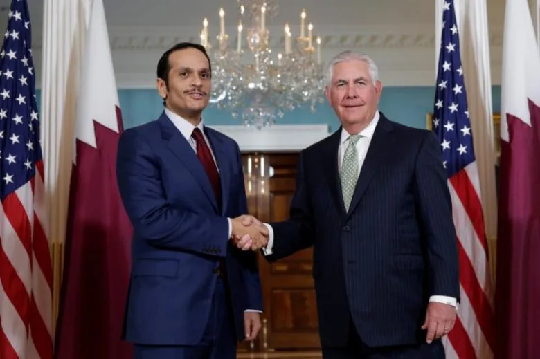 Qatar cứng rắn, Saudi Arabia quyết không thương lượng ảnh 2 Hai ngoại trưởng Mỹ Tillerson (phải) và Qatar Al Thani tại Bộ Ngoại giao Mỹ ngày 27-6. Ảnh: REUTERS