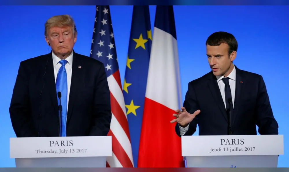Hai Tổng thống Macron và Trump họp báo sau cuộc gặp song phương tại điện Elysee ngày 13-7. Ảnh: REUTERS